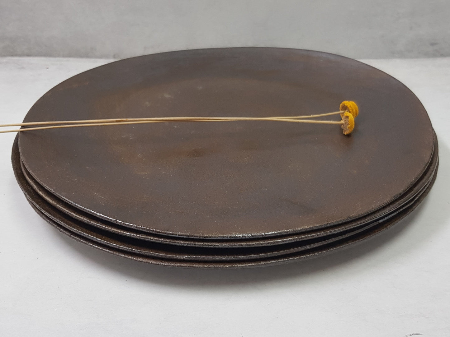 Side angle of handmade dinner plate