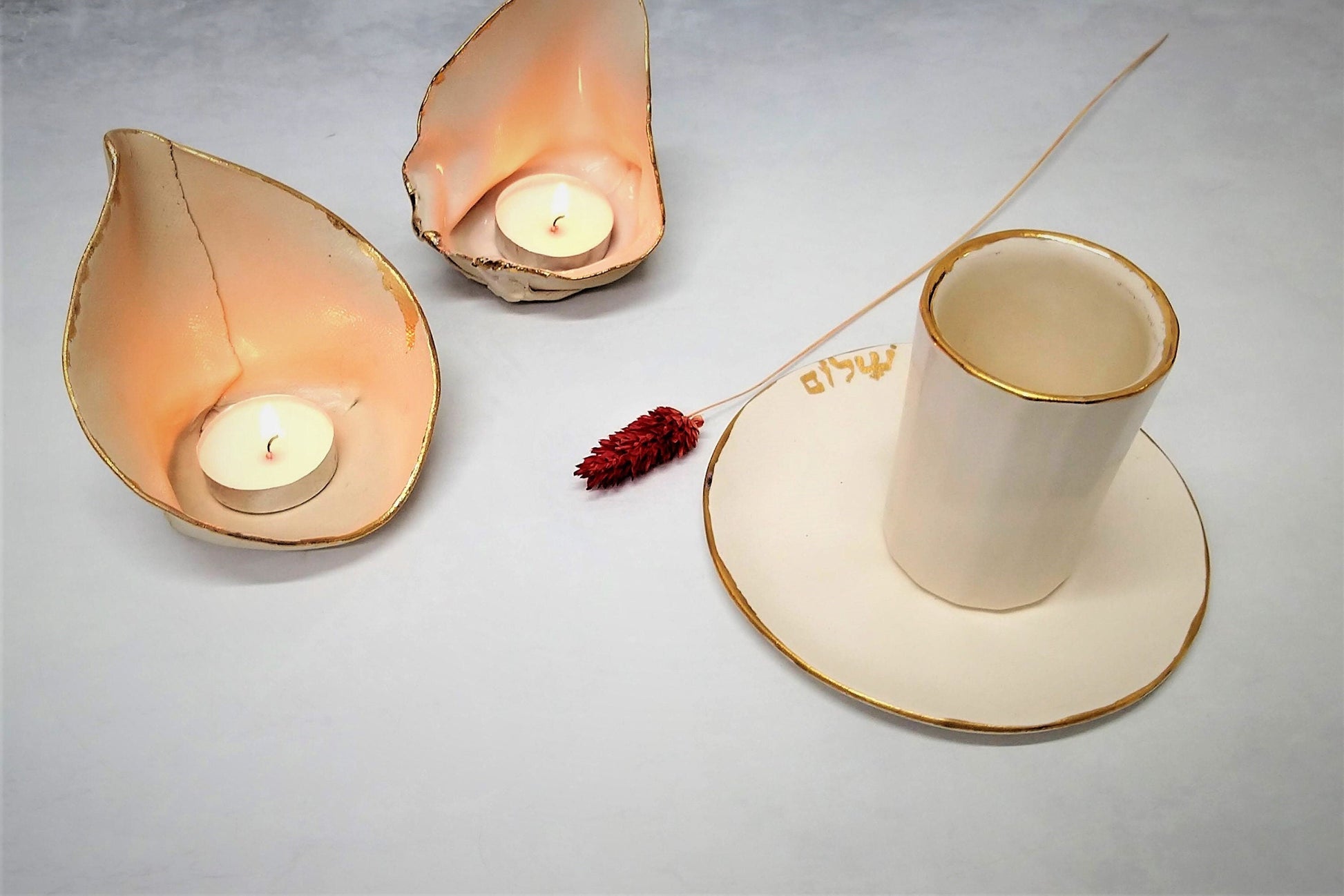 Ceramic kiddush cup and candlesticks
