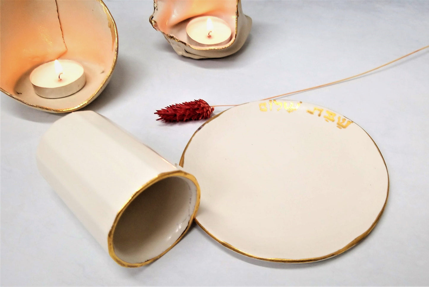 Ceramic cup with small saucer