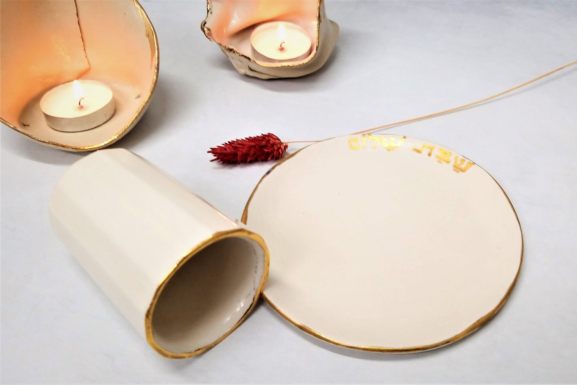 Ceramic cup with small saucer