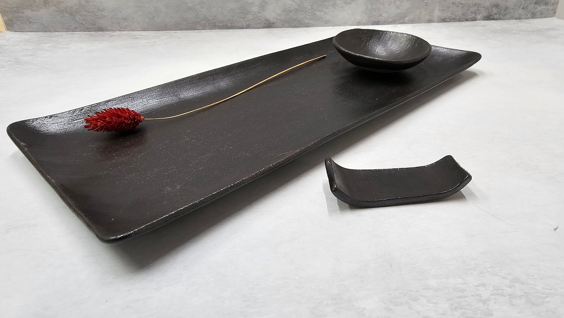 Handmade black ceramic sushi plate set