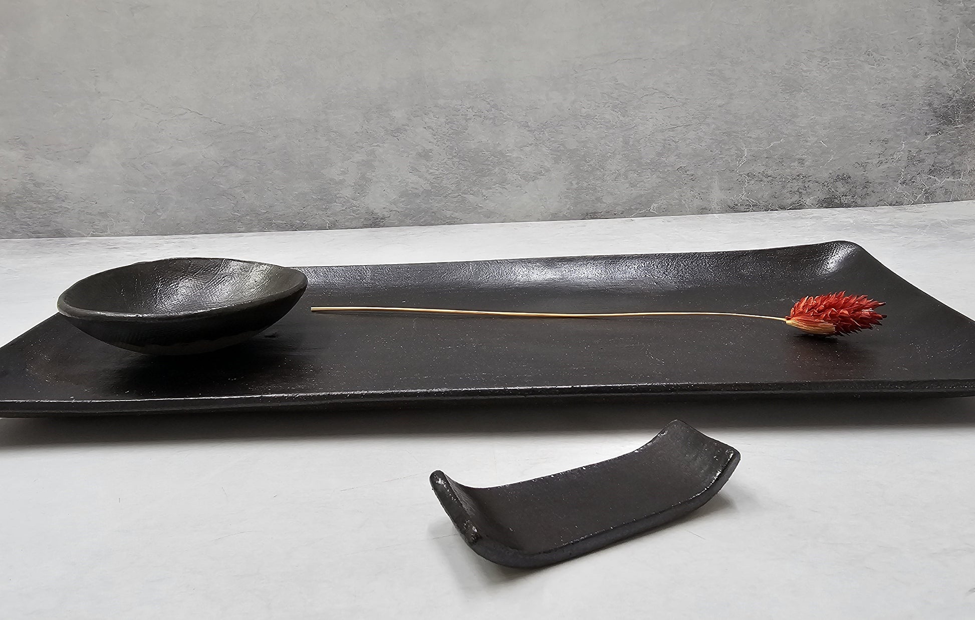 Close-up of matte black glaze texture