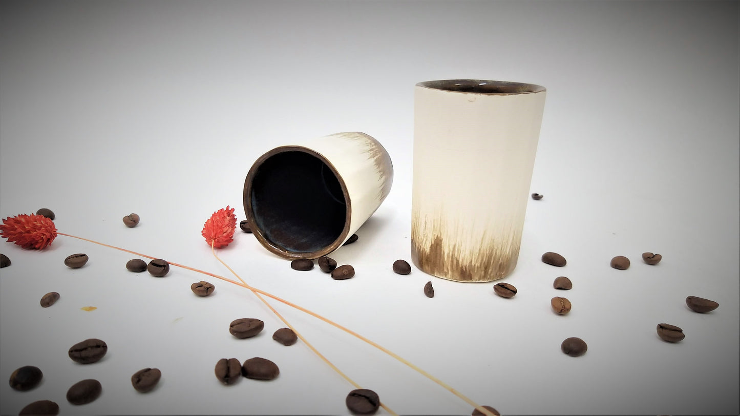 White and brown ceramic cups