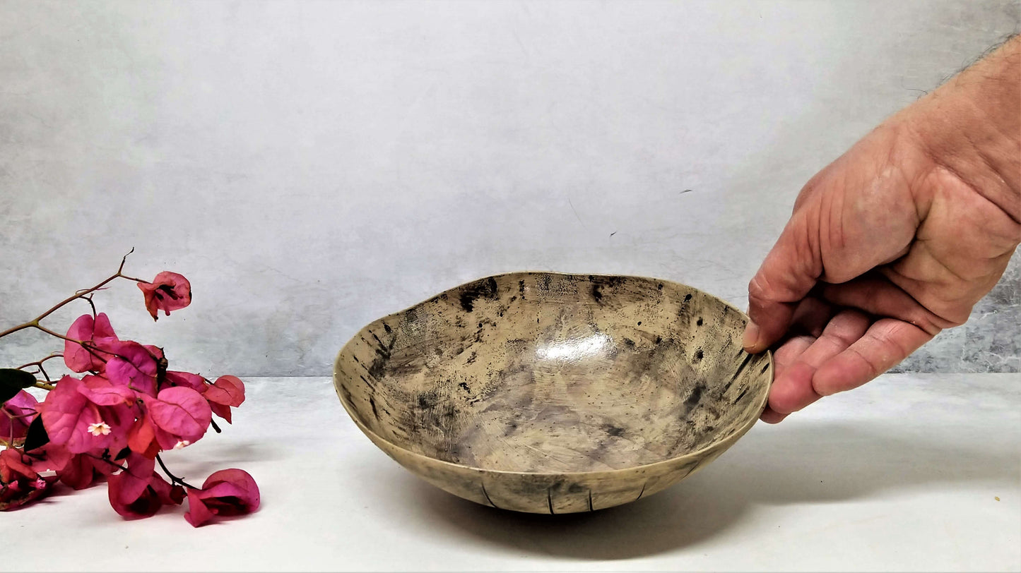 Ceramic light brown and black bowl