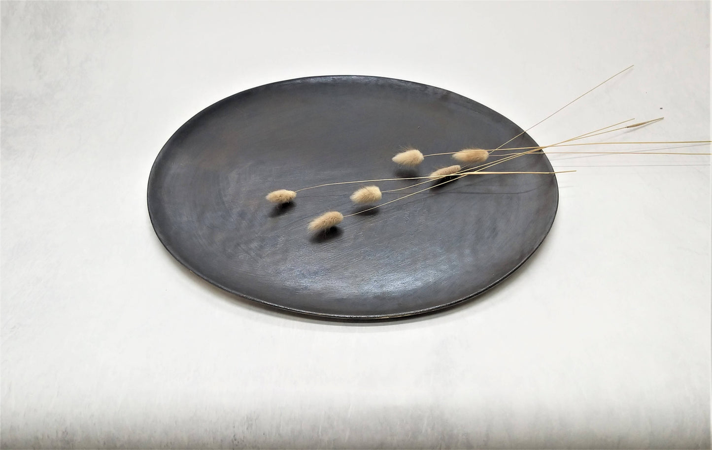 Rounded ceramic handmade tray