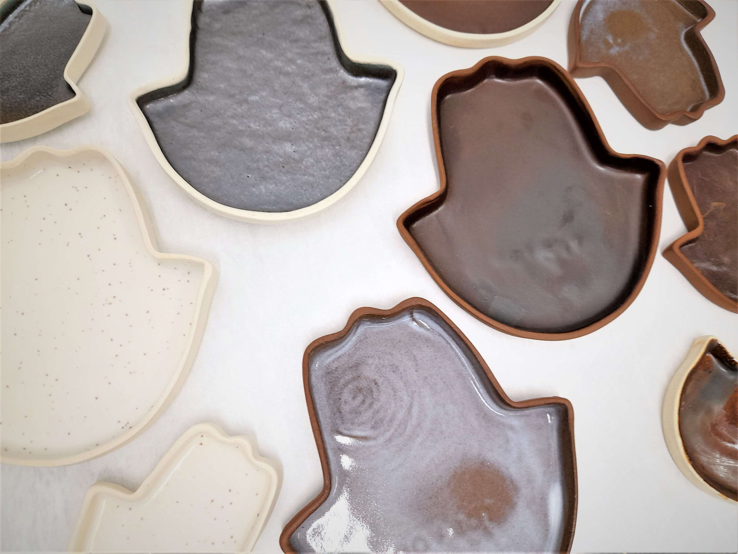 Hamsa-shaped plates