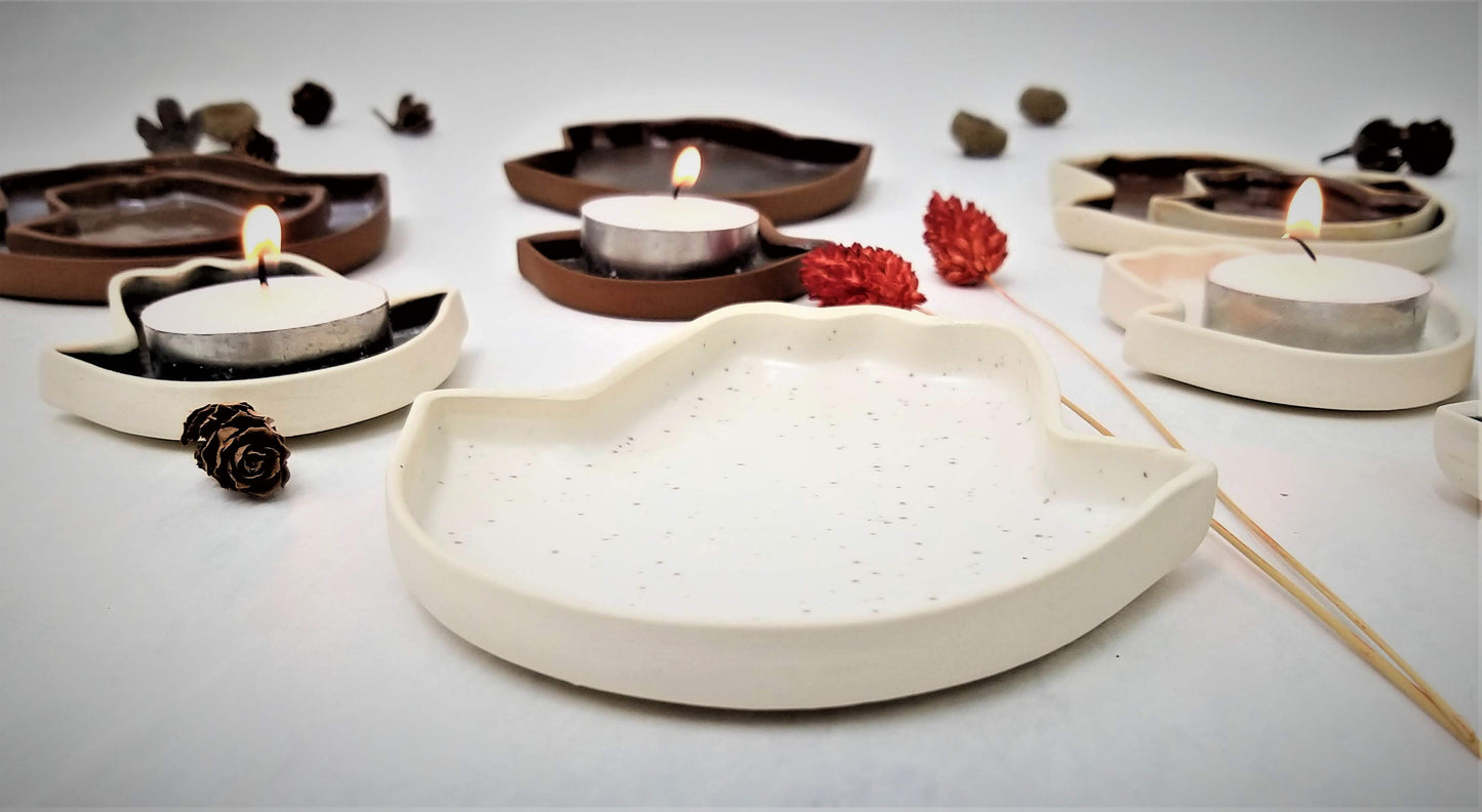 Handmade ceramic plate in the shape of Hamsa