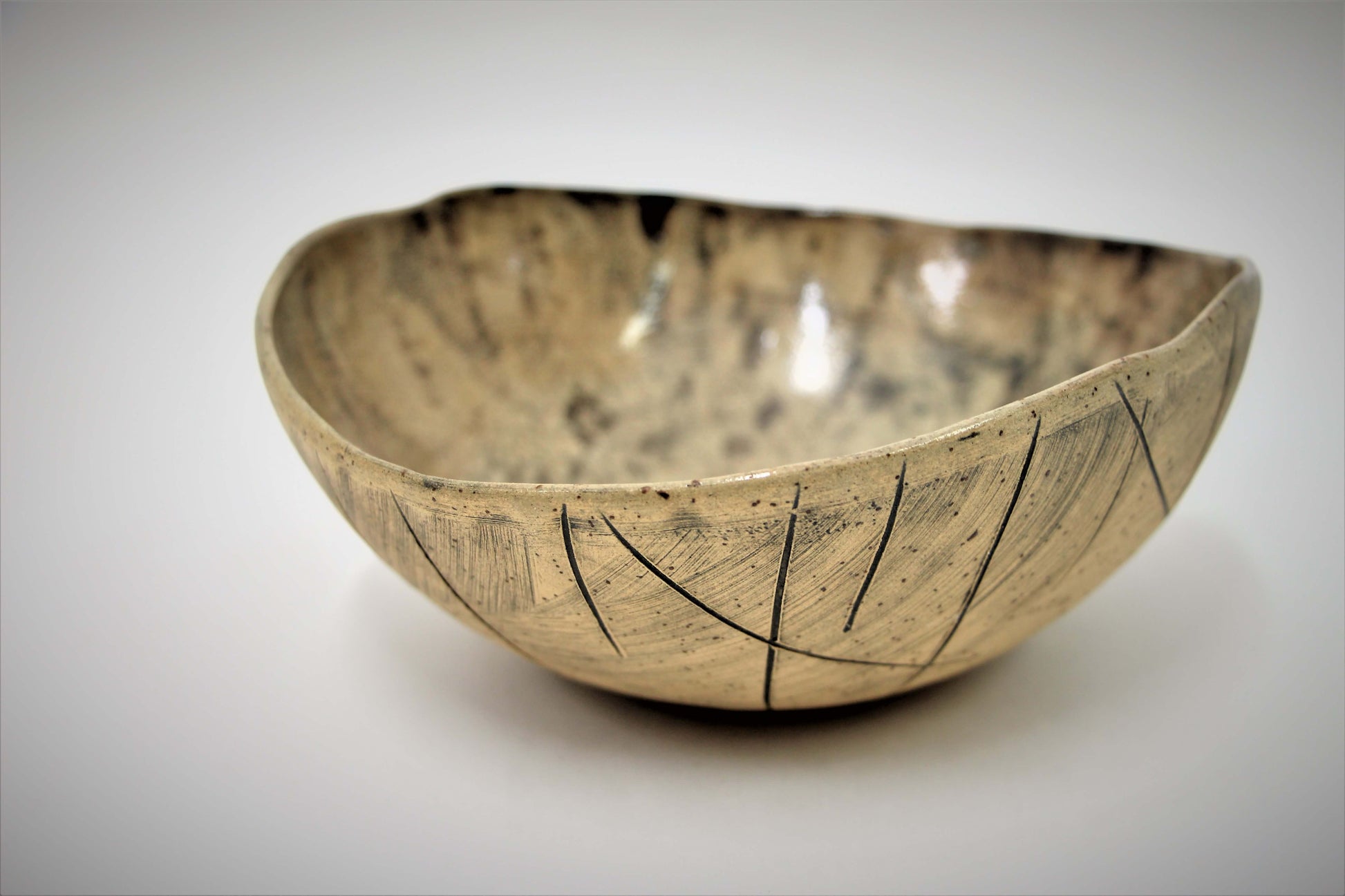 Brown and black ceramic bowl