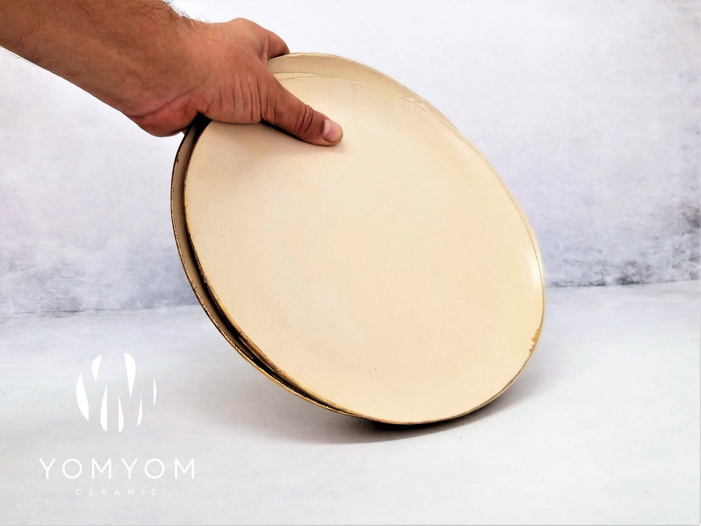 White and gold ceramic plates