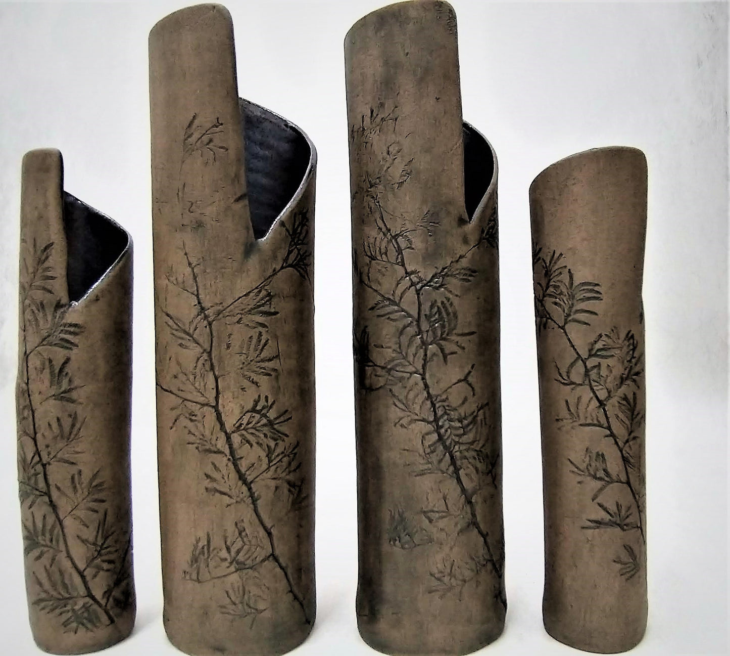 Tall thin gray ceramic vases