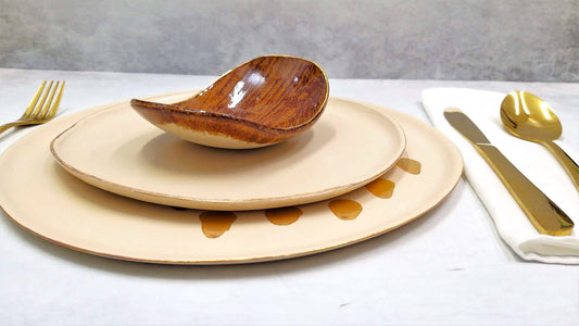 Handmade ceramic dinner plate with 24k gold dots, cream glaze