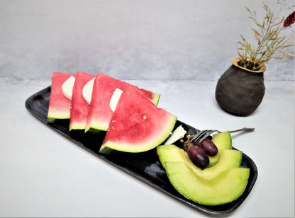 Black ceramic tray with watermelon