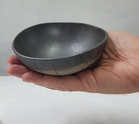 Small handmade black ceramic bowl
