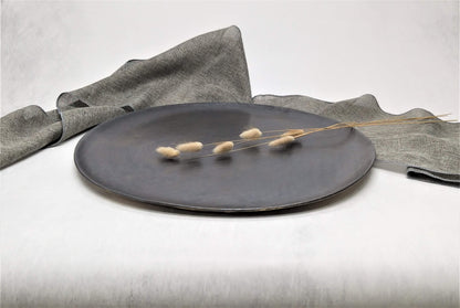 Black ceramic handmade tray for baking