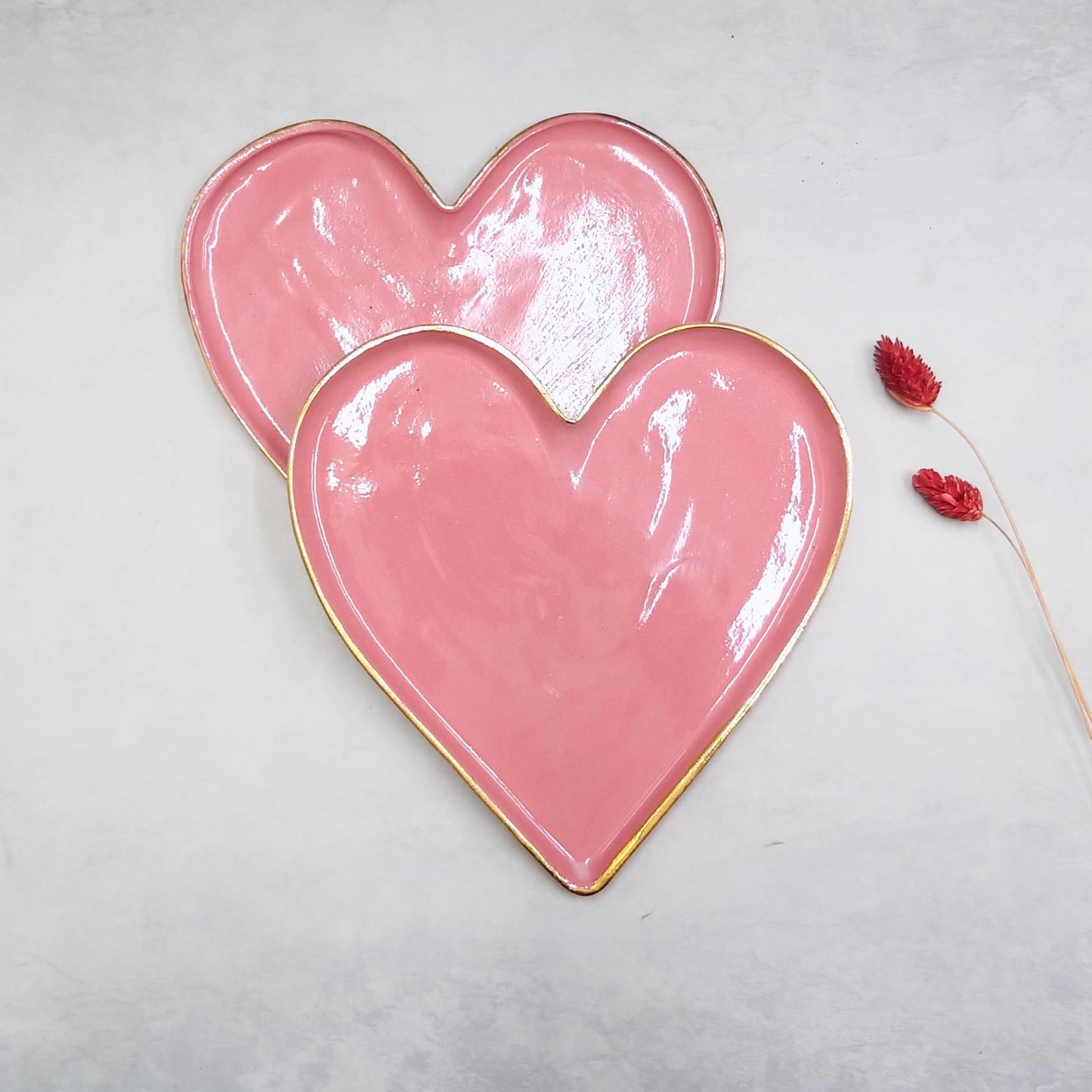 Two pink gold hearts shape ceramic plates 