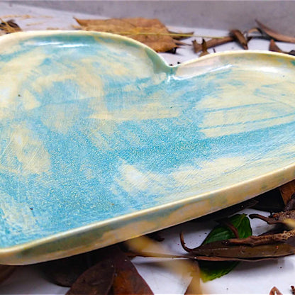 Bluish yellow slipcast ceramic heart dish