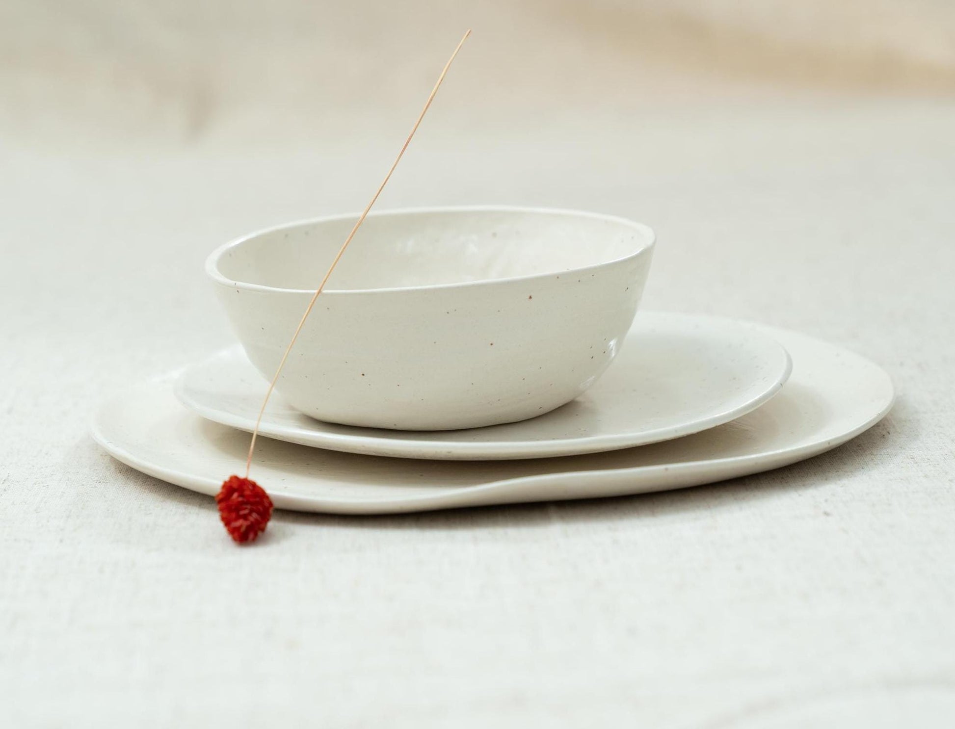 Layered plates with bowl on top