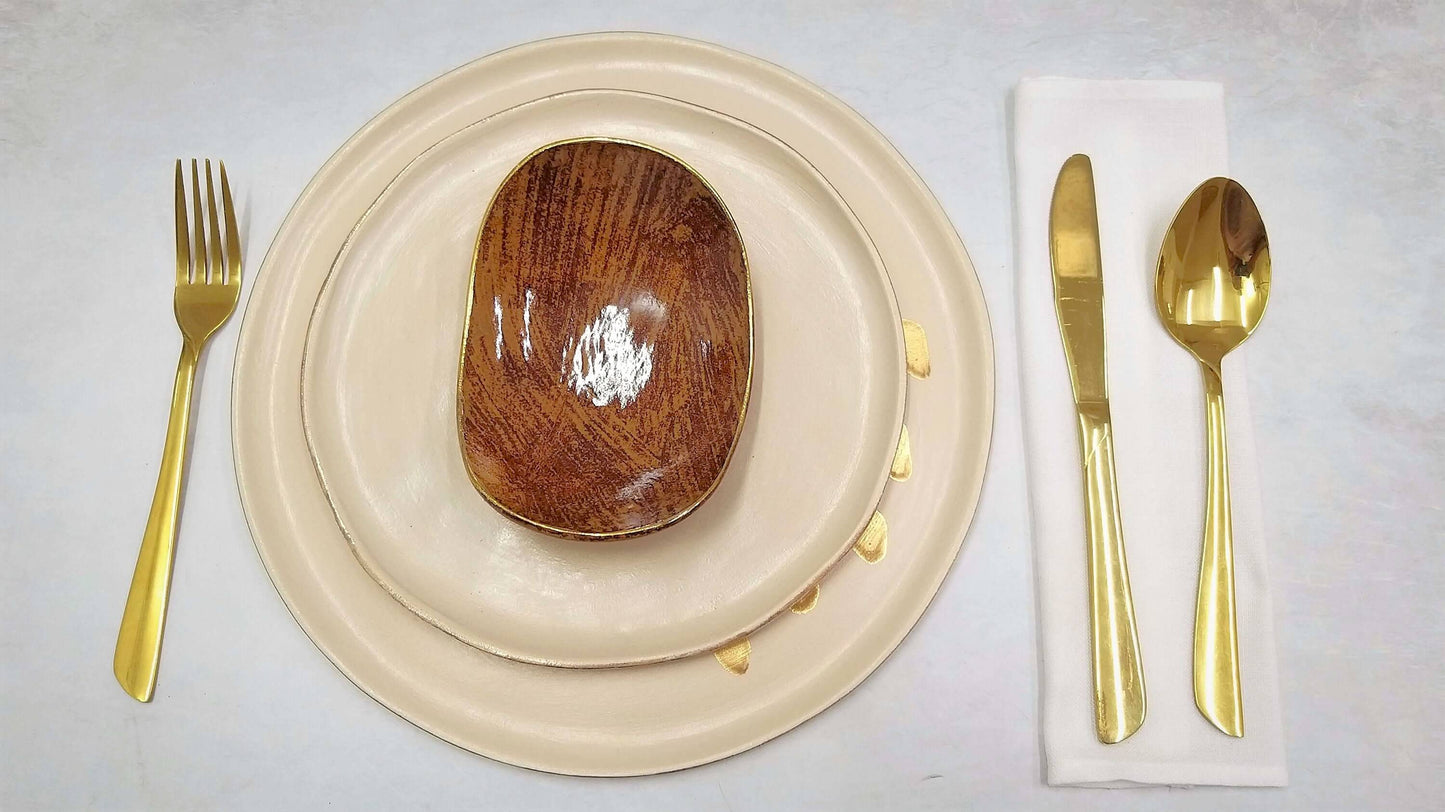 Modern rustic ceramic tableware set, handmade with golden accents