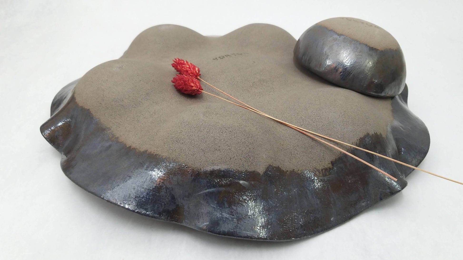 handmade platter with metallic glaze
