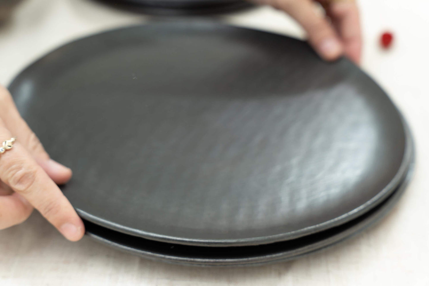 Black ceramic plate in elegant finish