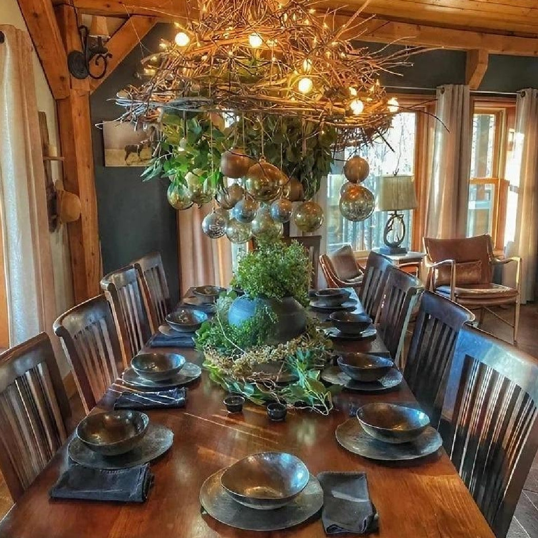 Table with black dinnerware set for 10 dining