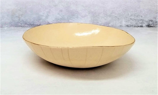 White cream with gold ceramic bowl
