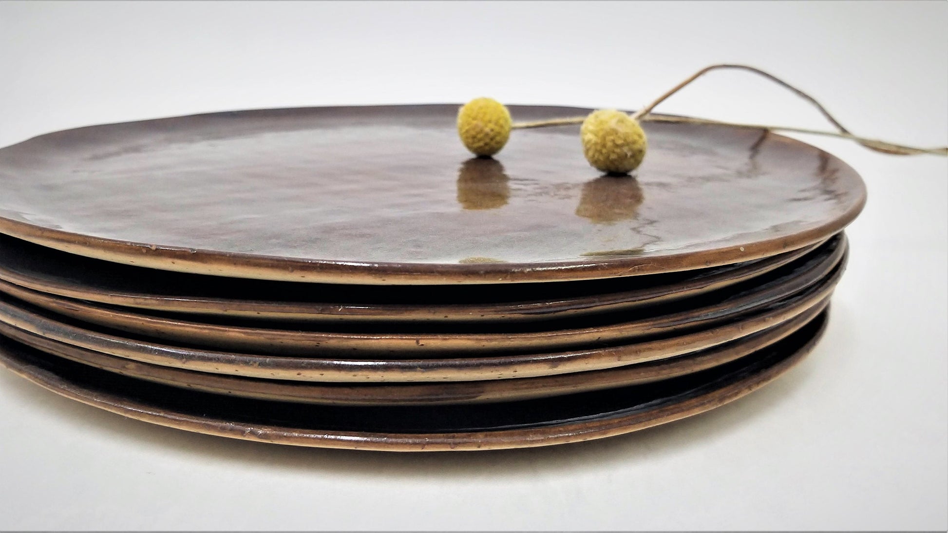 Brown Pottery Plate Set