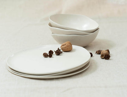 Minimalist ceramic design on cream fabric