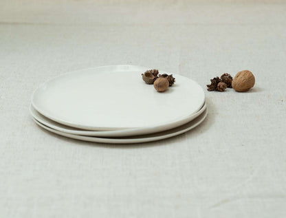 Hand-brushed white ceramic plates

