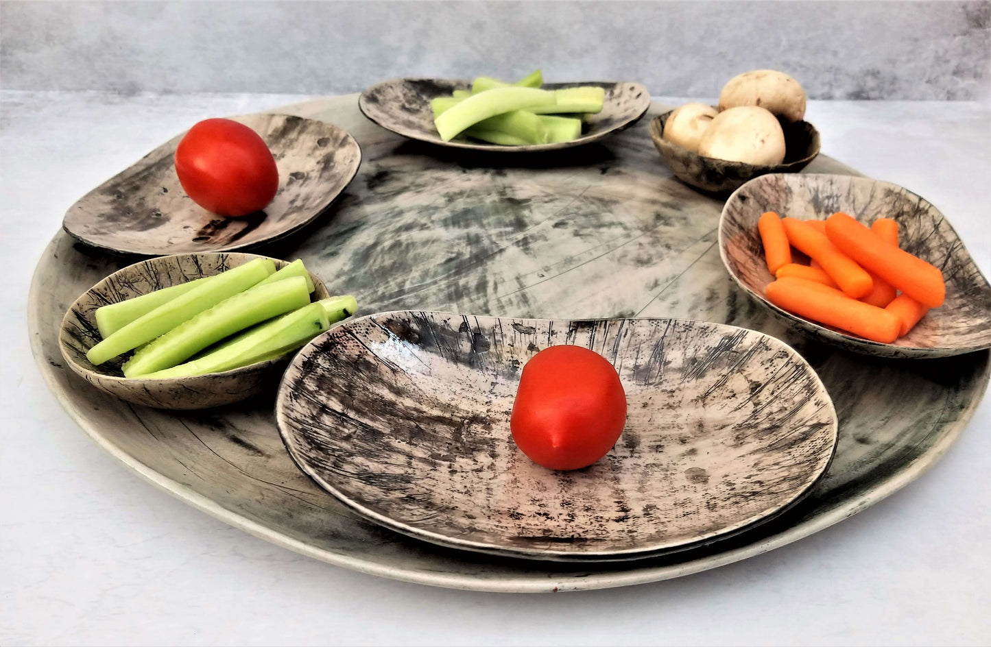 Ceramic handmade tray with food