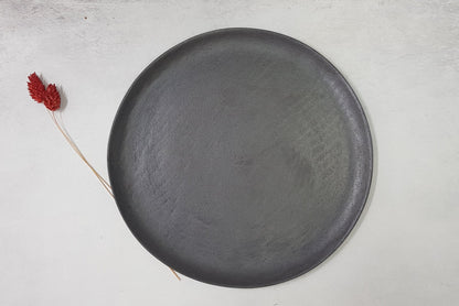 Black handmade ceramic plate
