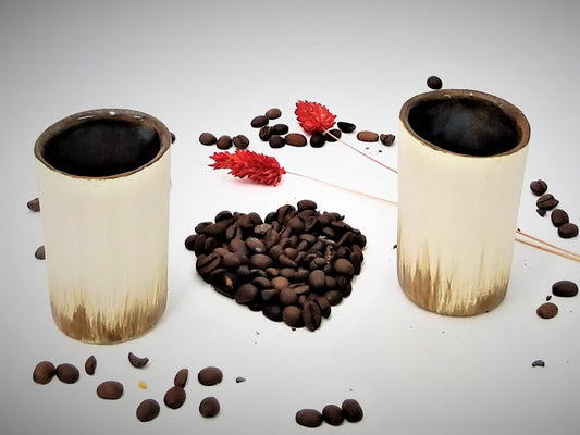 Two ceramic white brown cups