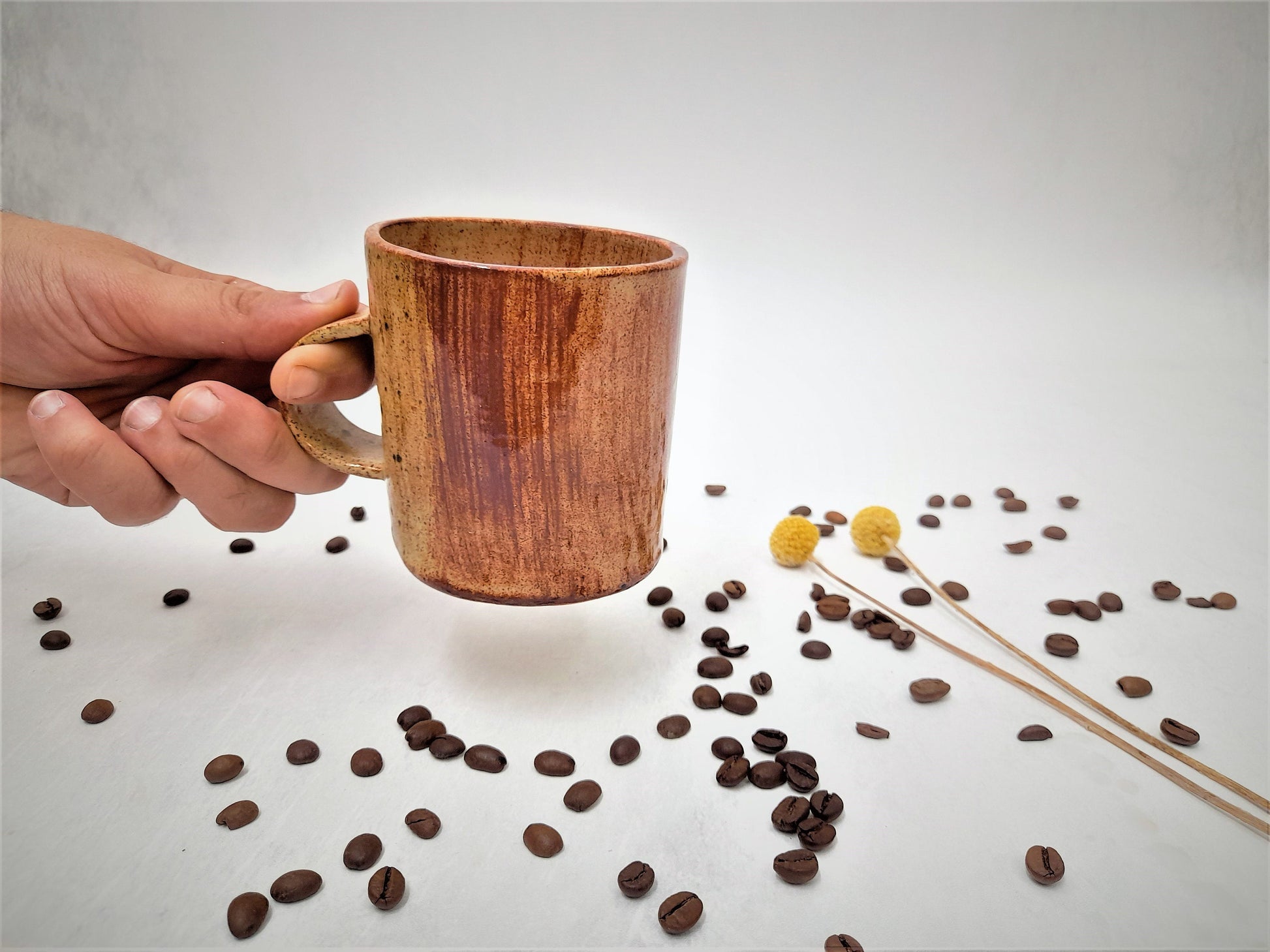 Brown ceramic coffee mug